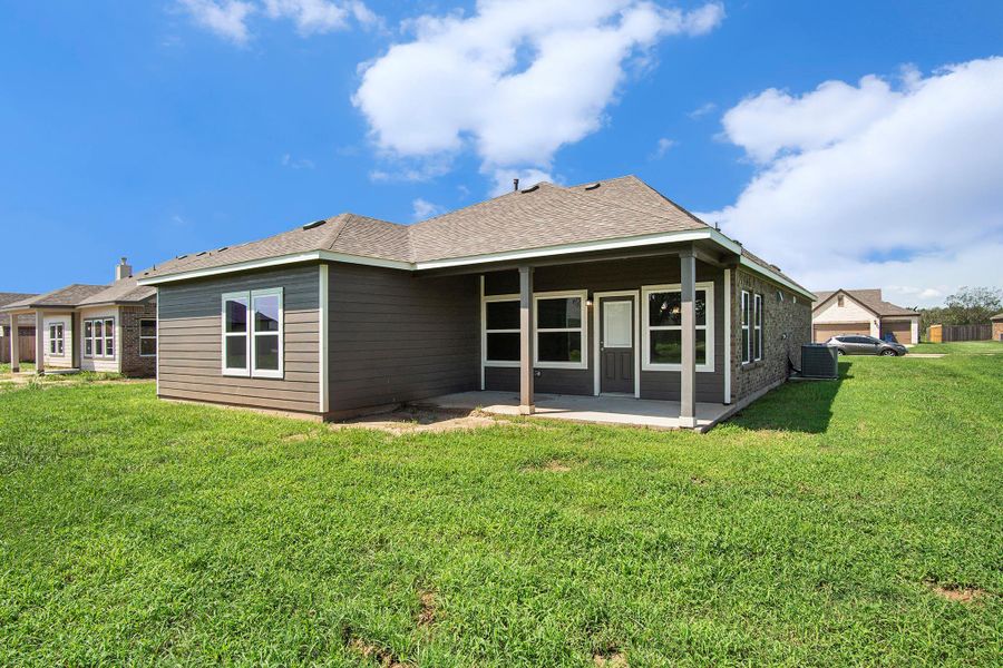 Front exterior of a new home in Columbia Lakes, West Columbia, TX, highlighting curb appeal (Image 1). Front exterior of a new home in Columbia Lakes, West Columbia, TX, highlighting curb appeal (Image 1).