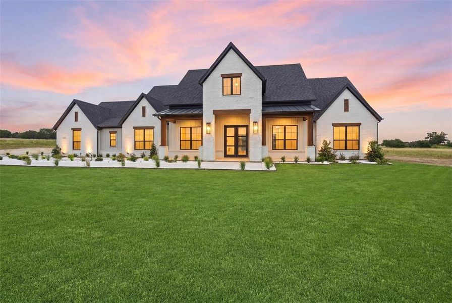 Front exterior of a new home in , Granbury, TX, highlighting curb appeal (Image 1). Front exterior of a new home in , Granbury, TX, highlighting curb appeal (Image 1).