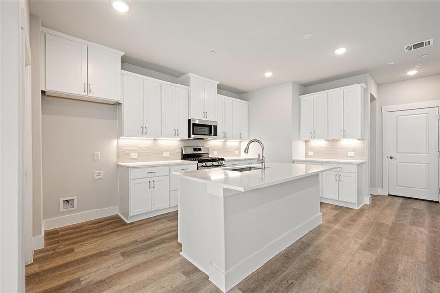 No shortage of storage, prep space or style in this dream kitchen!