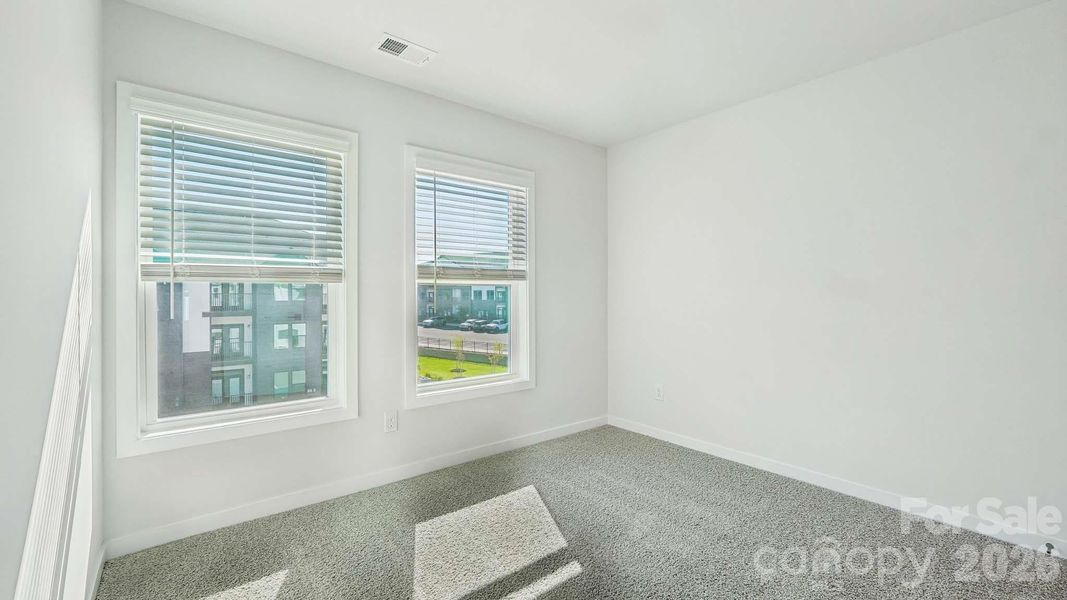 Spacious, unfurnished interior of a new home in The Townes at Lake Norman, Mooresville (Image 19).