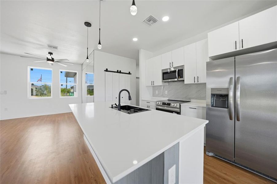Furnished interior view inside a new home in , Port Charlotte (Image 10).