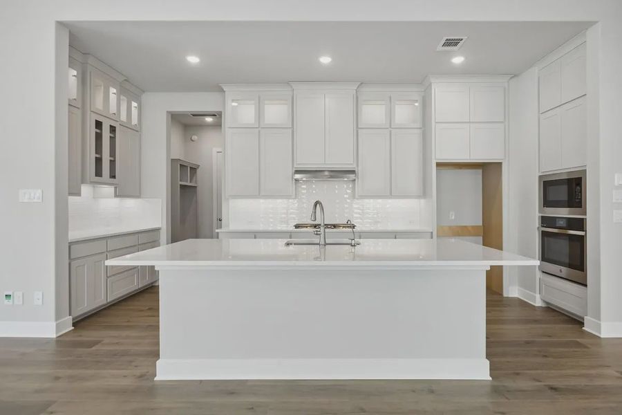Furnished interior view inside a new home in The Grove Frisco, Frisco (Image 5).