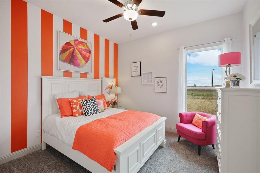 Bedroom with carpet and ceiling fan