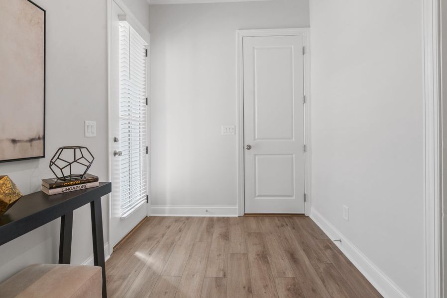 Representative furnished interior of a home built from the The Bullard by The Providence Group in Promenade at Sawnee Village, Cumming (Image 19).