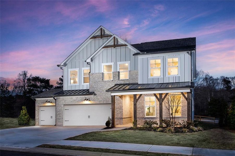 Front exterior of a new home in Hopewell Reserve, Cumming, GA, highlighting curb appeal (Image 2). Front exterior of a new home in Hopewell Reserve, Cumming, GA, highlighting curb appeal (Image 2).