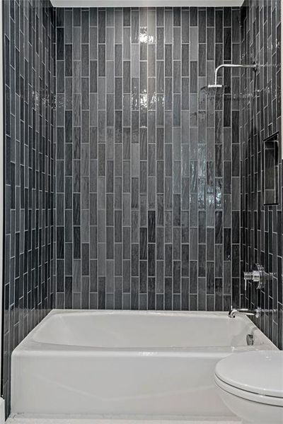 The gorgeous accent tile in one of the upstairs baths