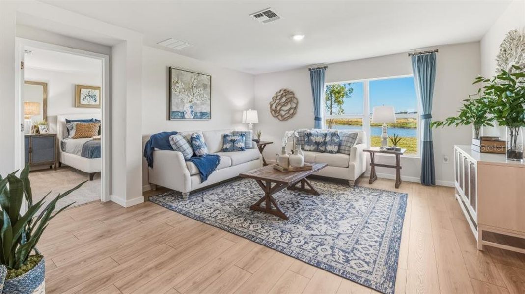 Furnished interior view inside a new home in Seagrass - Express & Tradition, Punta Gorda (Image 10). Furnished interior view inside a new home in Seagrass - Express & Tradition, Punta Gorda (Image 10).
