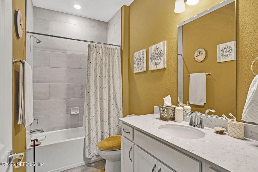 Furnished interior view inside a new home in Tributary: Lakeview at Tributary 60's, Yulee (Image 27).