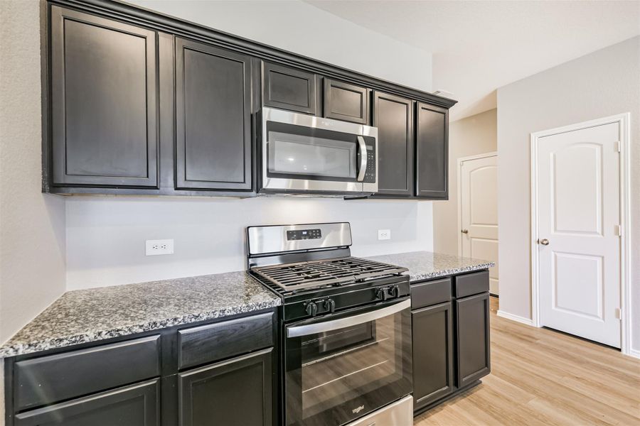 Furnished interior view inside a new home in Harrington Trails at The Canopies, New Caney (Image 11).