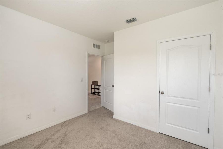 Spacious, unfurnished interior of a new home in Poinciana Enclave, Kissimmee (Image 20).