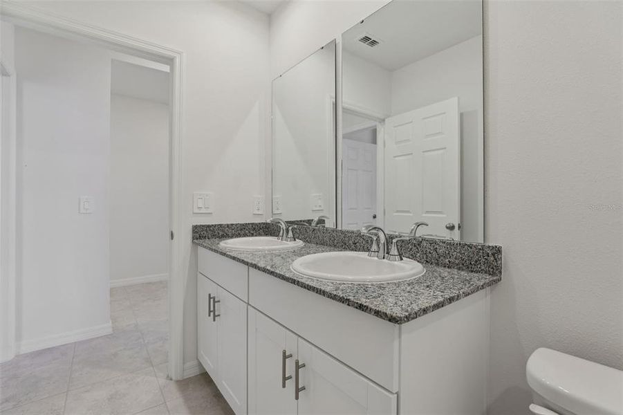 Furnished interior view inside a new home in Lawson Dunes - Signature Series, Haines City (Image 9). Furnished interior view inside a new home in Lawson Dunes - Signature Series, Haines City (Image 9).