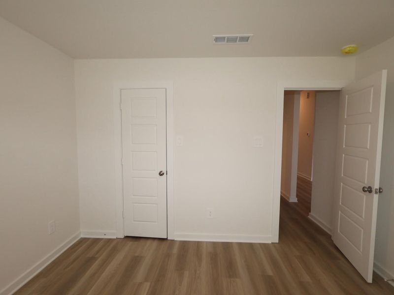 Spacious, unfurnished interior of a new home in Pinewood at Grand Texas, New Caney (Image 19).