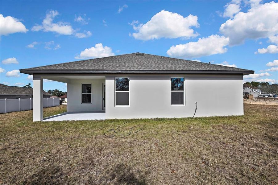 Exterior details and patio area of a home in , Brooksville (Image 3).