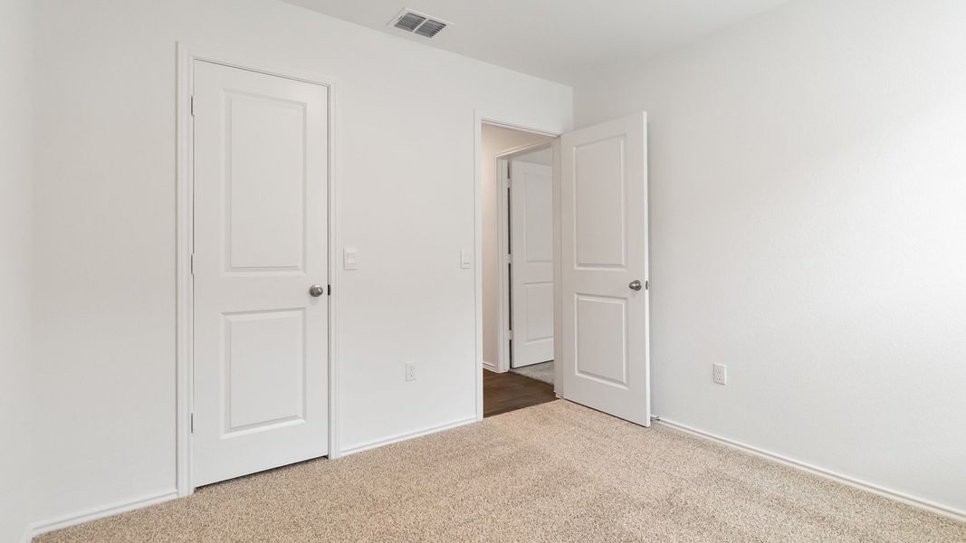 Representative unfurnished interior of a home built from the The Juniper by D.R. Horton in Palomino, Manor (Image 20).