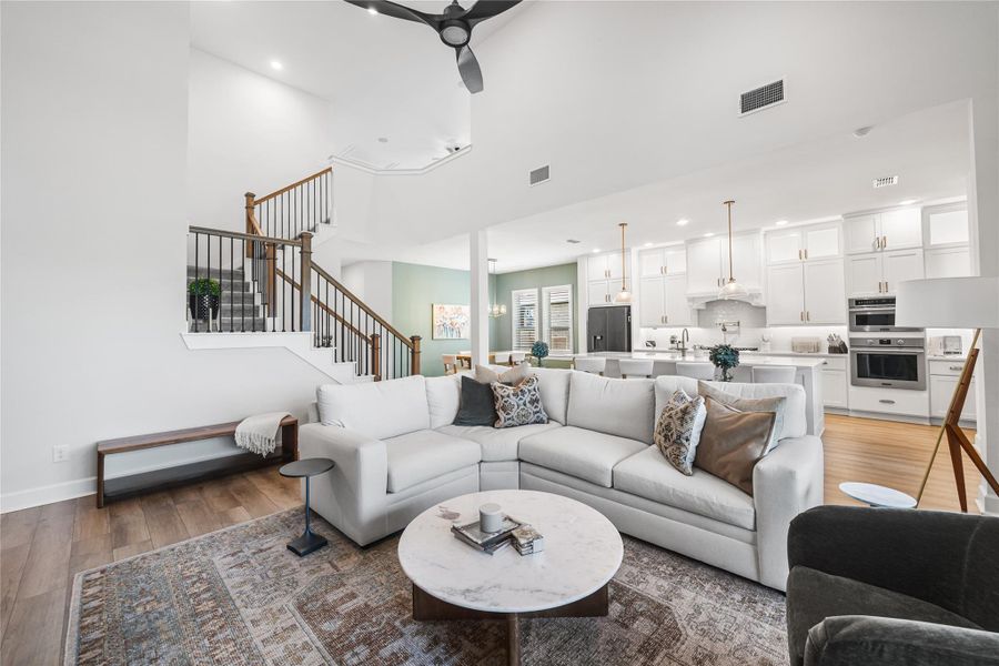 Spacious and inviting living area with abundant natural light and sliding glass doors providing seamless access to the outdoor living space