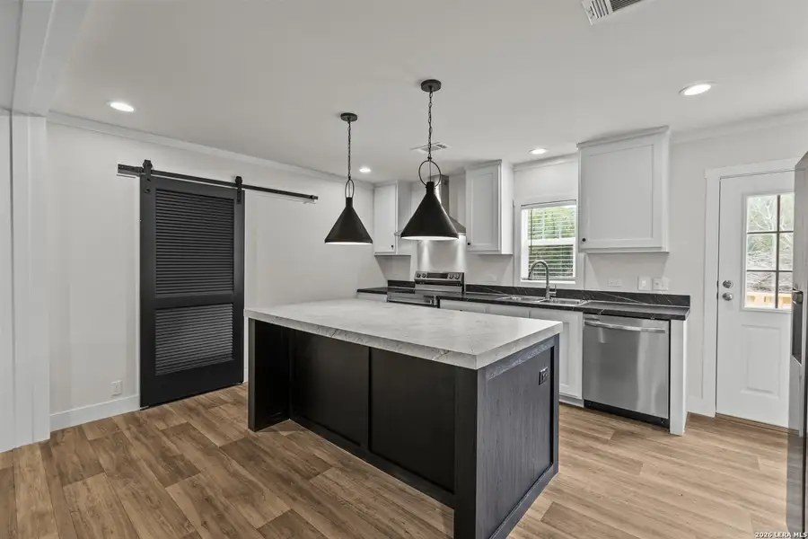 Furnished interior view inside a new home in , Devine (Image 8).