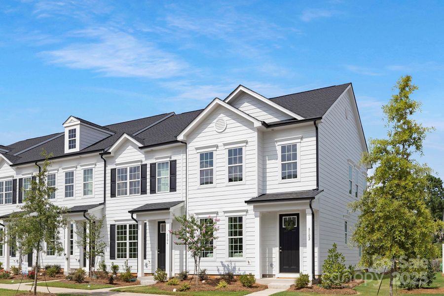 Front exterior of a new home in Edgewood Preserve, Huntersville, NC, highlighting curb appeal (Image 2). Front exterior of a new home in Edgewood Preserve, Huntersville, NC, highlighting curb appeal (Image 2).