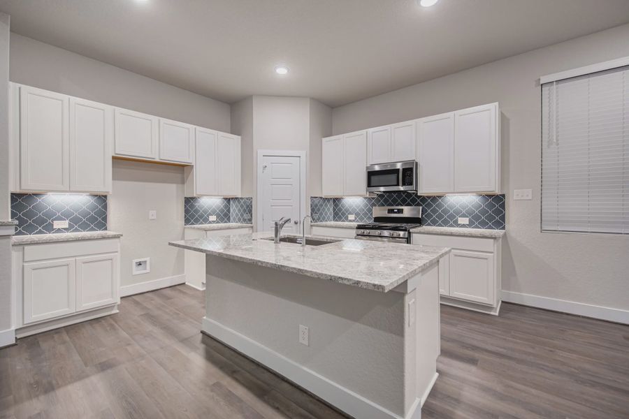 Representative furnished interior of a home built from the Sterling by Chesmar Homes in Stillwater Ranch, Buda (Image 7).