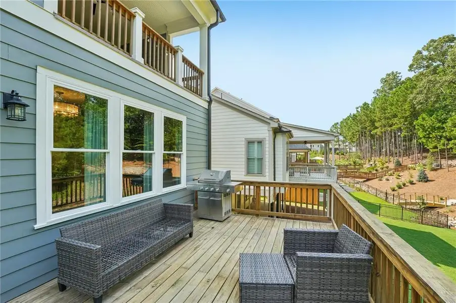 Exterior details and patio area of a home in Lakeside at River Green, Canton (Image 3).