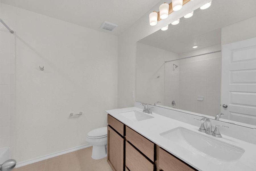 Furnished interior view inside a new home in Salerno - Heritage Collection, Round Rock (Image 4). Furnished interior view inside a new home in Salerno - Heritage Collection, Round Rock (Image 4).