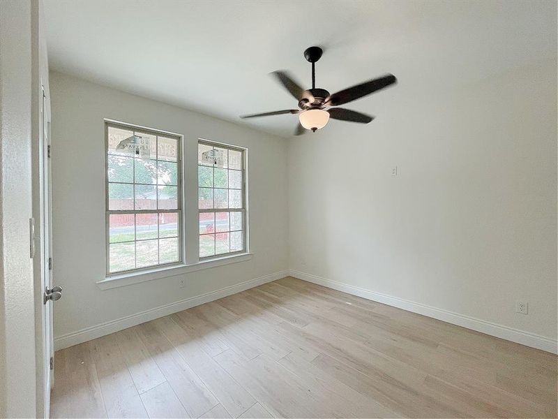 Secondary bedroom that over-looks the front patio