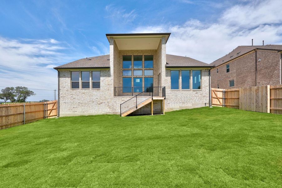 Front exterior of a new home in Lakeside at Tessera - 60', Lago Vista, TX, highlighting curb appeal (Image 21). Front exterior of a new home in Lakeside at Tessera - 60', Lago Vista, TX, highlighting curb appeal (Image 21).