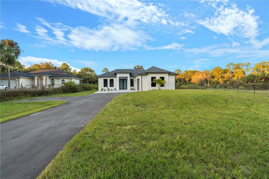Exterior details and patio area of a home in , Naples (Image 33). Exterior details and patio area of a home in , Naples (Image 33).