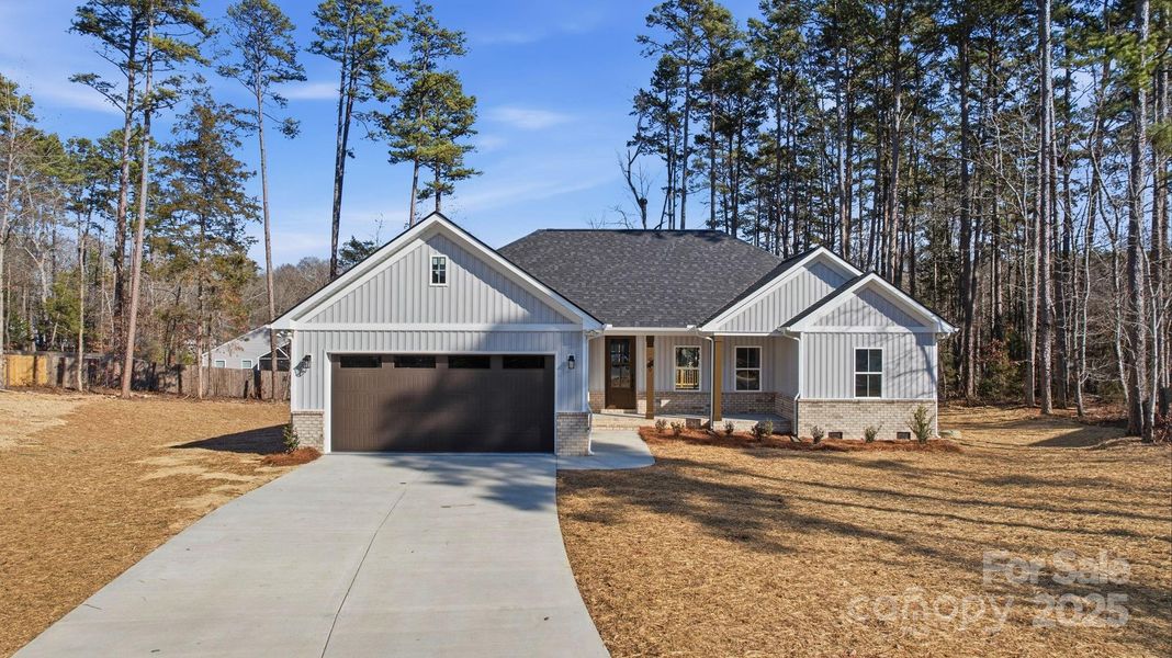 Front exterior of a new home in , Oakboro, NC, highlighting curb appeal (Image 19).