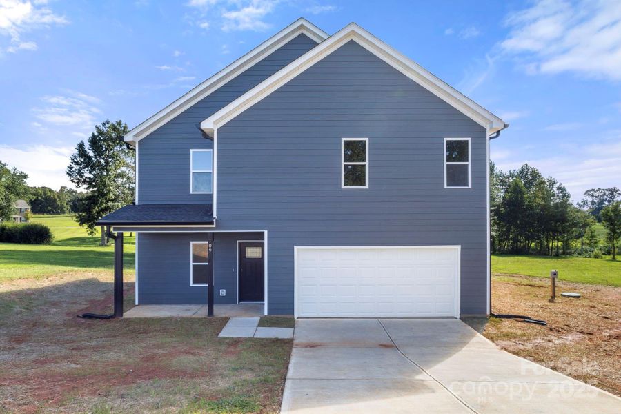 Front exterior of a new home in , Shelby, NC, highlighting curb appeal (Image 2).
