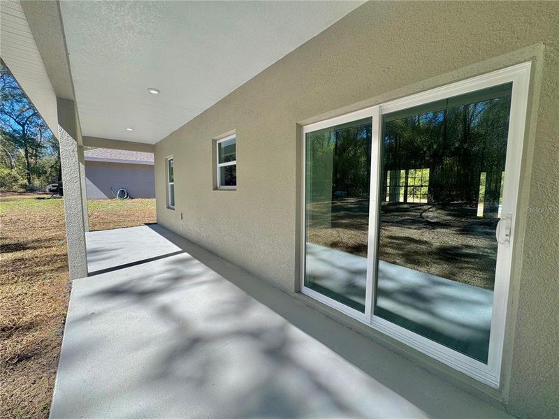 Exterior details and patio area of a home in , Citrus Springs (Image 19).