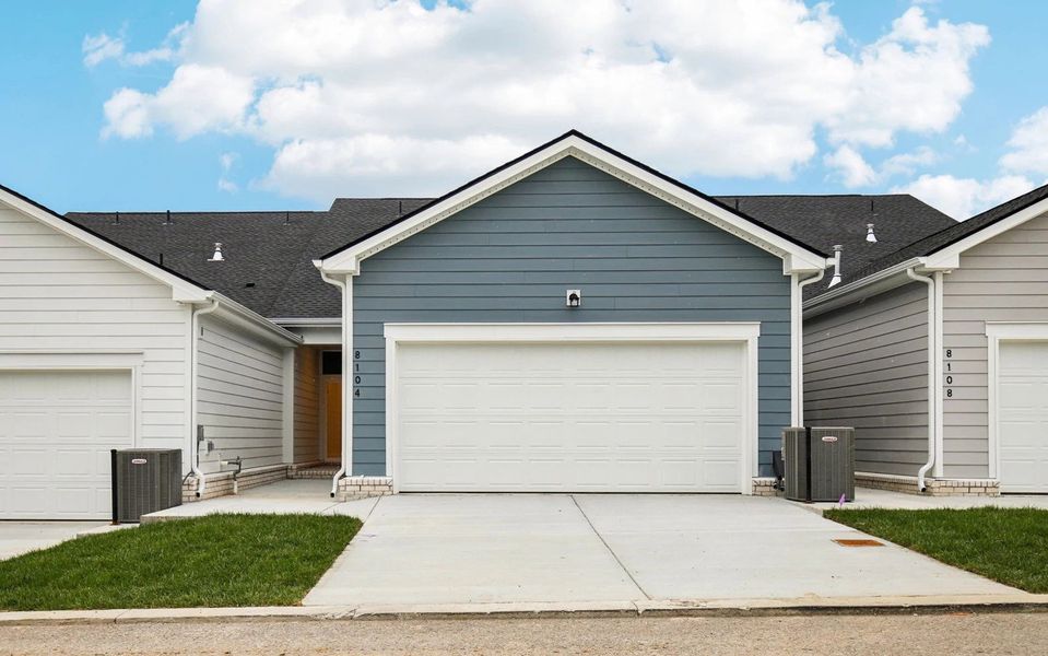 Front exterior of a new home in Stewart's Glen | 55+ Community, Smyrna, TN, highlighting curb appeal (Image 27). Front exterior of a new home in Stewart's Glen | 55+ Community, Smyrna, TN, highlighting curb appeal (Image 27).