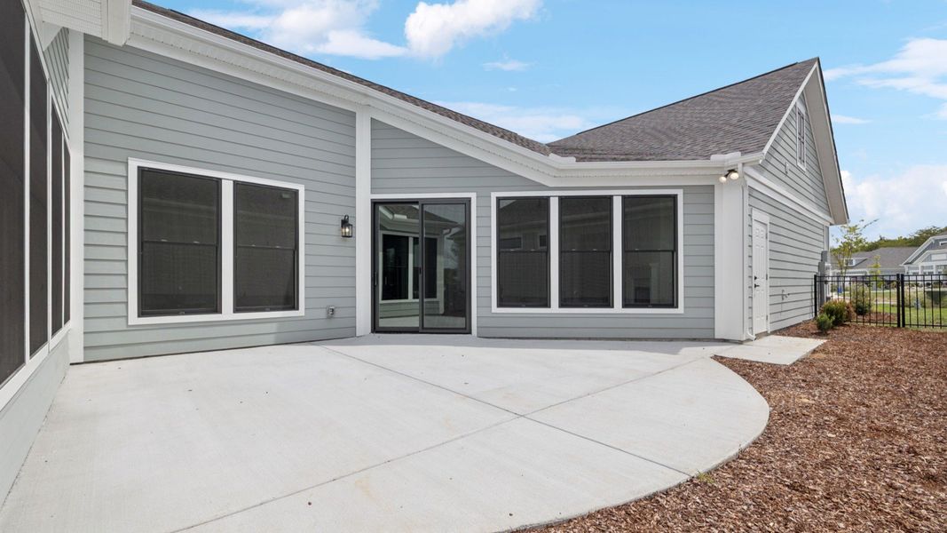 Exterior details and patio area of a home in The Courtyards at Stewarts Creek, Smyrna (Image 27).