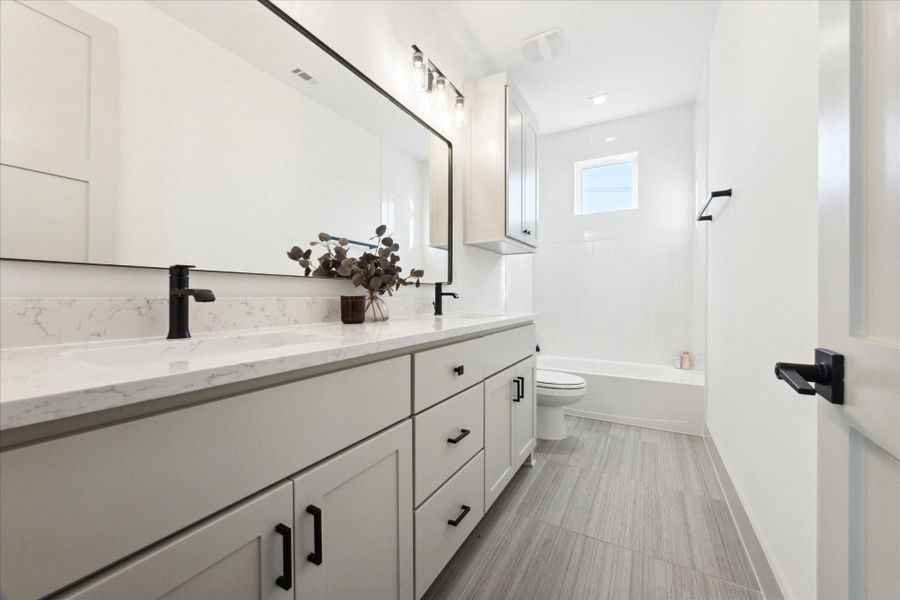 Upstairs bath with dual vanities