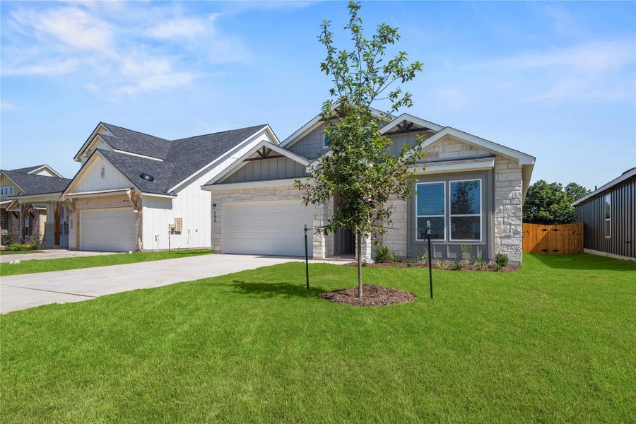 Front exterior of a new home in Rancho San Gabriel, Georgetown, TX, highlighting curb appeal (Image 17).