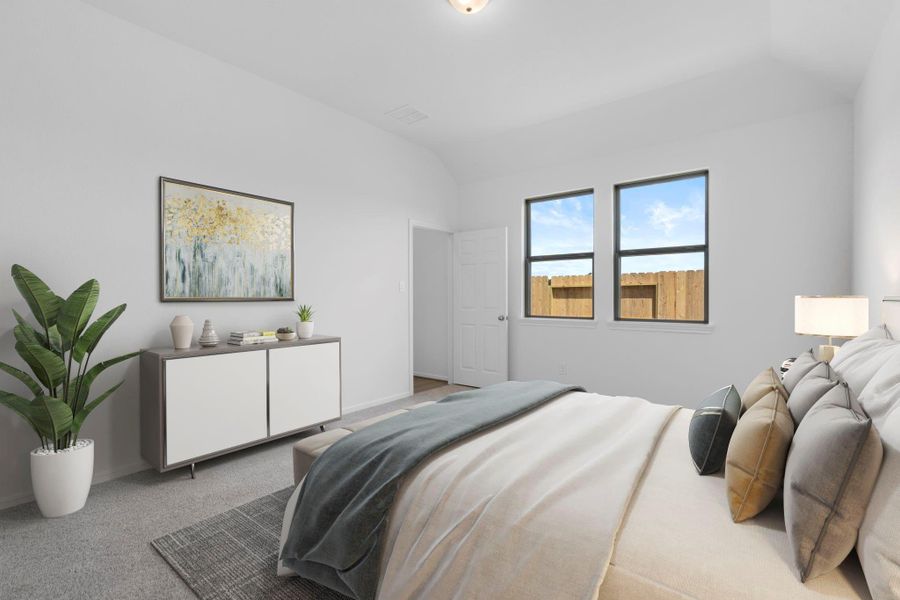 The primary bedroom is generously sized, creating a tranquil and spacious retreat that offers ample room for relaxation. Featuring plush carpet, high ceilings, fresh paint, and large windows that lets in natural lighting throughout the day. The primary bedroom is generously sized, creating a tranquil and spacious retreat that offers ample room for relaxation. Featuring plush carpet, high ceilings, fresh paint, and large windows that lets in natural lighting throughout the day.