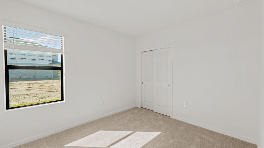 Spacious, unfurnished interior of a new home in Whispering Lakes, Lehigh Acres (Image 23). Spacious, unfurnished interior of a new home in Whispering Lakes, Lehigh Acres (Image 23).