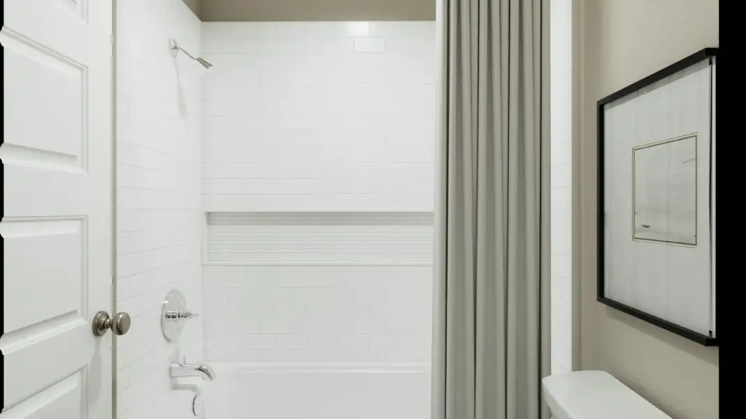 Representative furnished interior of a home built from the The Emerald by Legend Homes in River's Edge, Conroe (Image 24).