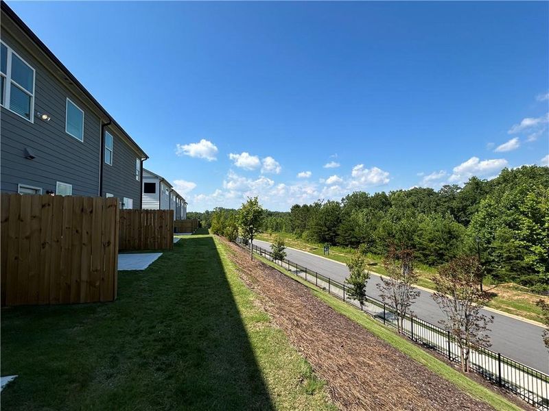 Exterior details and patio area of a home in Somerset at Riverbrook, Gainesville (Image 3).