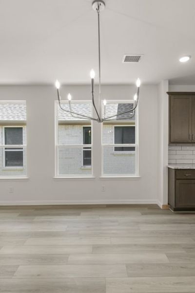 Representative unfurnished interior of a home built from the Cypress by UnionMain Homes in Edgewater, Fate (Image 34).