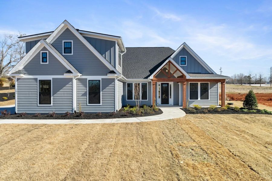 Front exterior of a new home in , Walterboro, SC, highlighting curb appeal (Image 19).