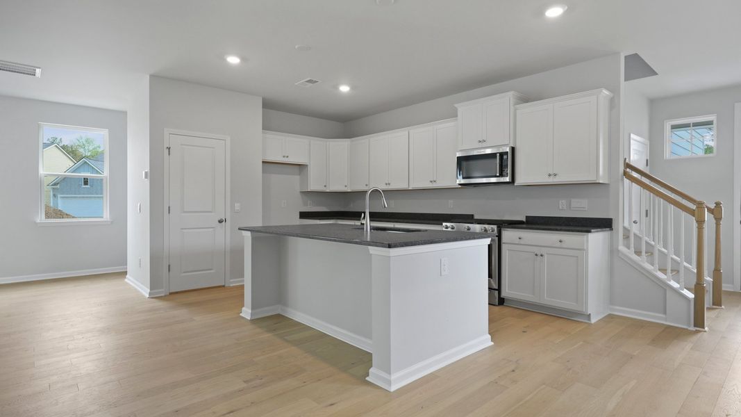 Representative furnished interior of a home built from the RUBY by D.R. Horton in Founders Corner, Summerville (Image 5).