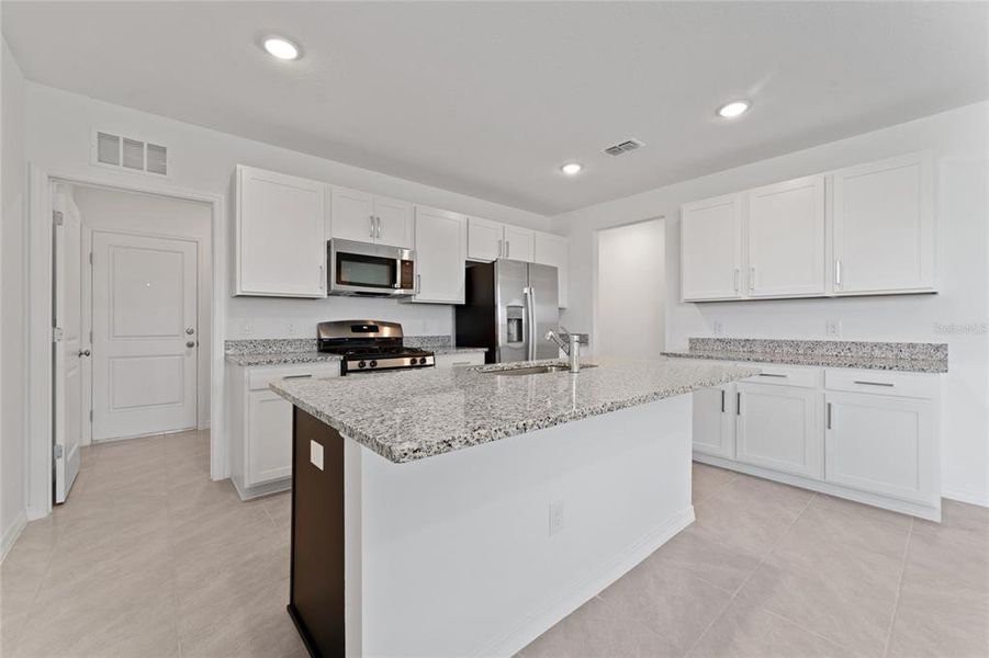 Furnished interior view inside a new home in , Winter Garden (Image 3).