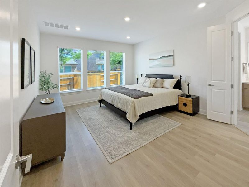 Bedroom featuring light wood-style floors and recessed lighting
