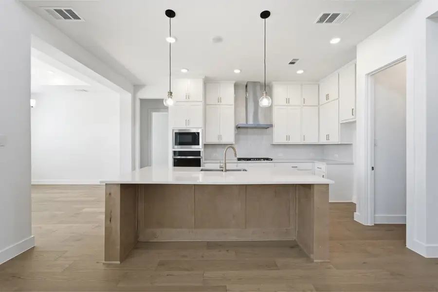 Furnished interior view inside a new home in Green Meadows, Celina (Image 8).