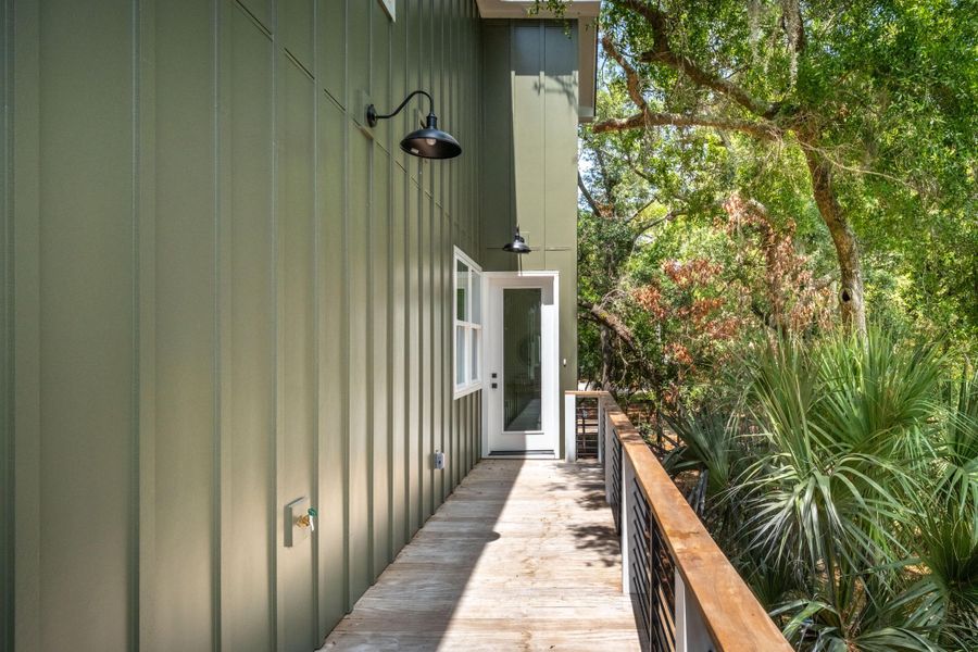 Exterior details and patio area of a home in , Edisto Island (Image 33).