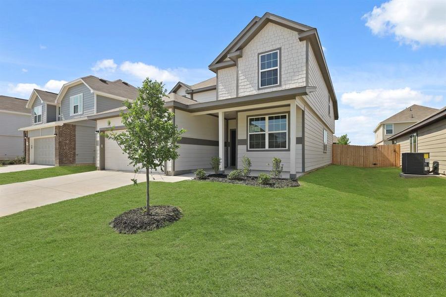 Front exterior of a new home in Sycamore Landing, Fort Worth, TX, highlighting curb appeal (Image 14). Front exterior of a new home in Sycamore Landing, Fort Worth, TX, highlighting curb appeal (Image 14).