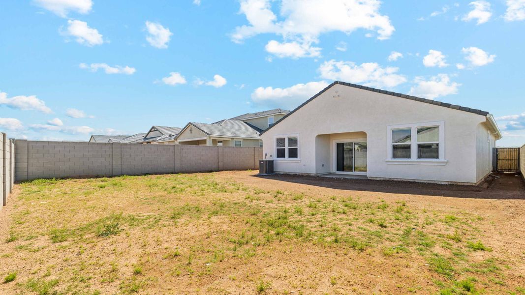 Exterior details and patio area of a home in Radiance at Superstition Vistas, Mesa (Image 21).