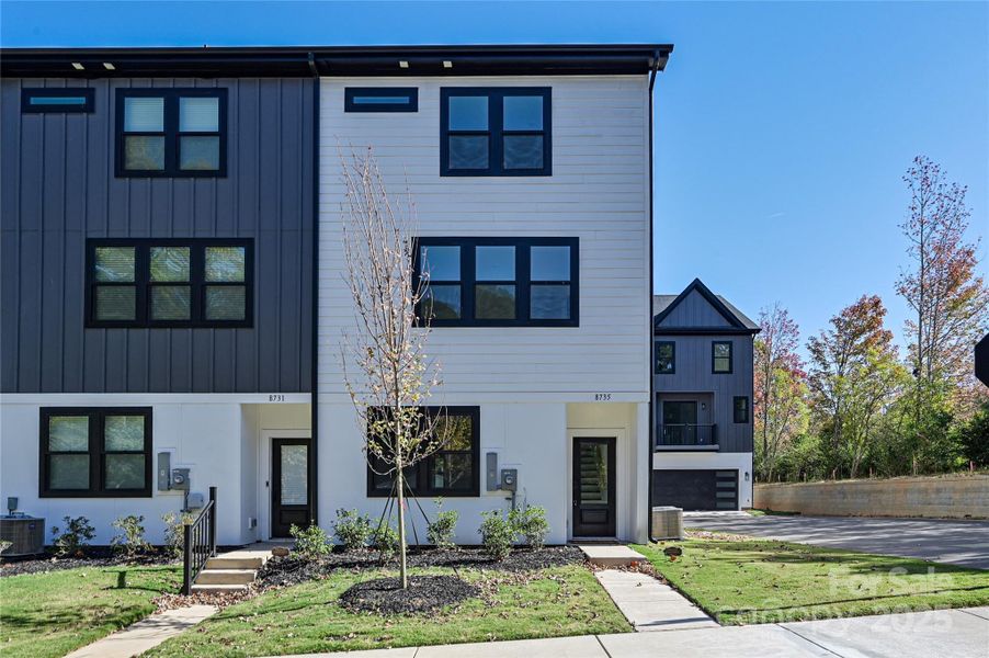 Front exterior of a new home in , Charlotte, NC, highlighting curb appeal (Image 2). Front exterior of a new home in , Charlotte, NC, highlighting curb appeal (Image 2).