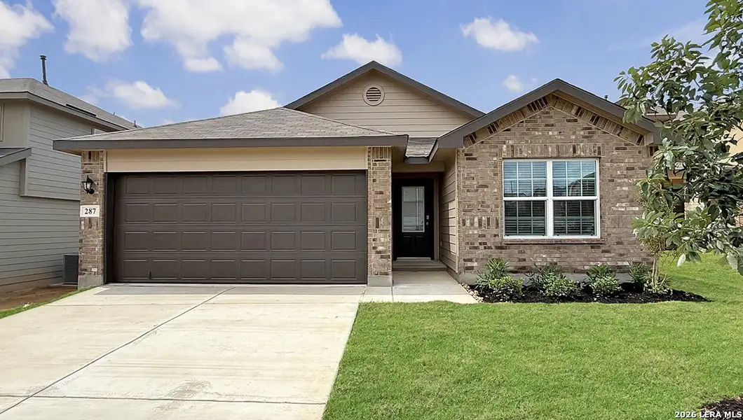 Front exterior of a new home in Redbird Ranch, San Antonio, TX, highlighting curb appeal (Image 1). Front exterior of a new home in Redbird Ranch, San Antonio, TX, highlighting curb appeal (Image 1).