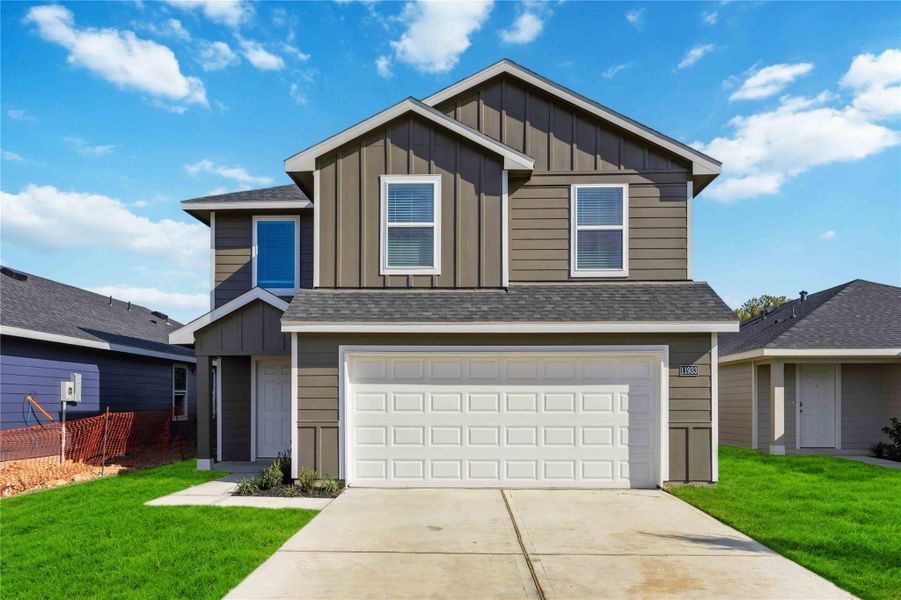 Front exterior of a new home in Legacy Village, Houston, TX, highlighting curb appeal (Image 2). Front exterior of a new home in Legacy Village, Houston, TX, highlighting curb appeal (Image 2).